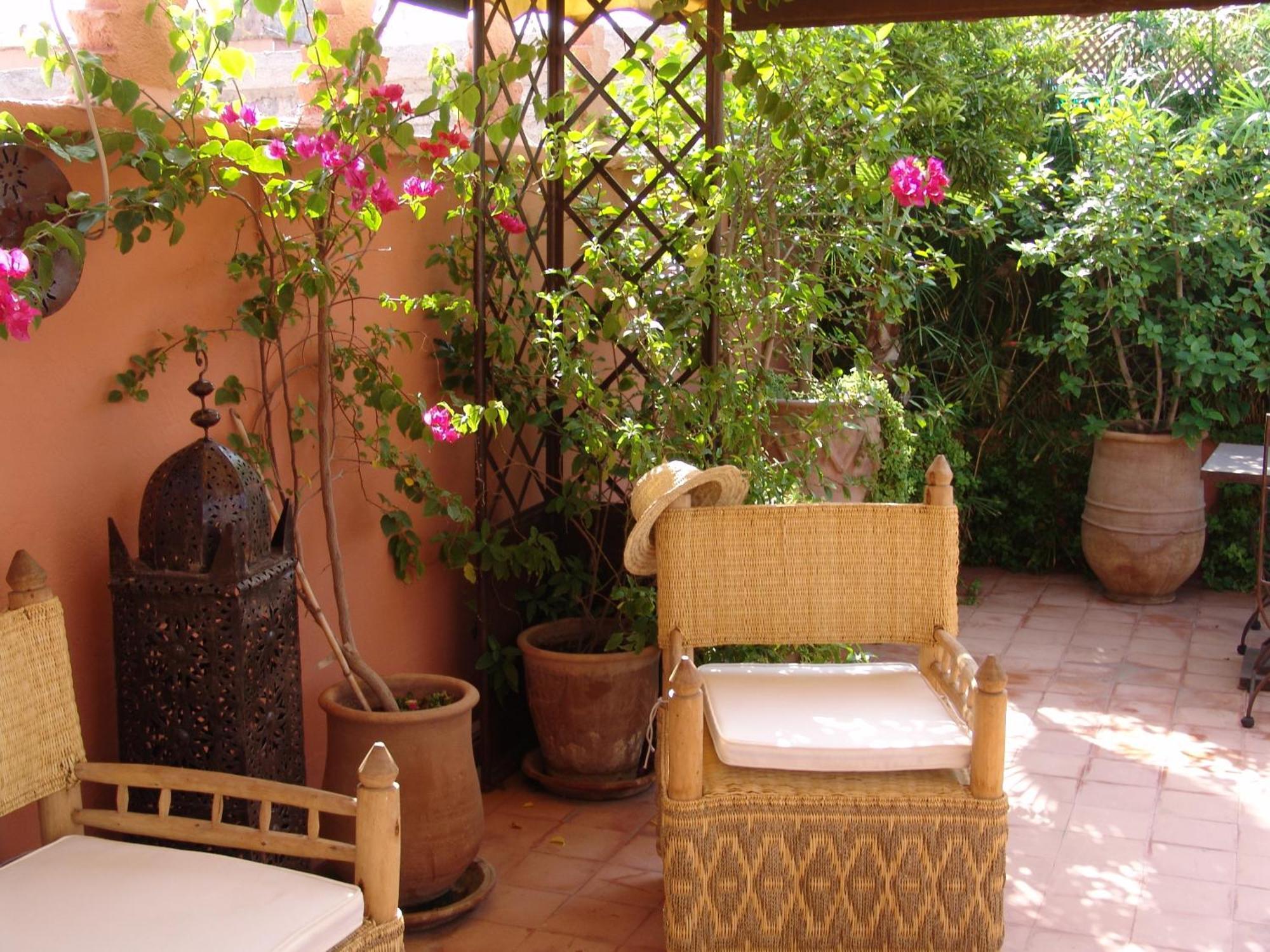 Riad Les Nuits De Marrakech Marrakesh Exterior photo A terrace in Marrakech