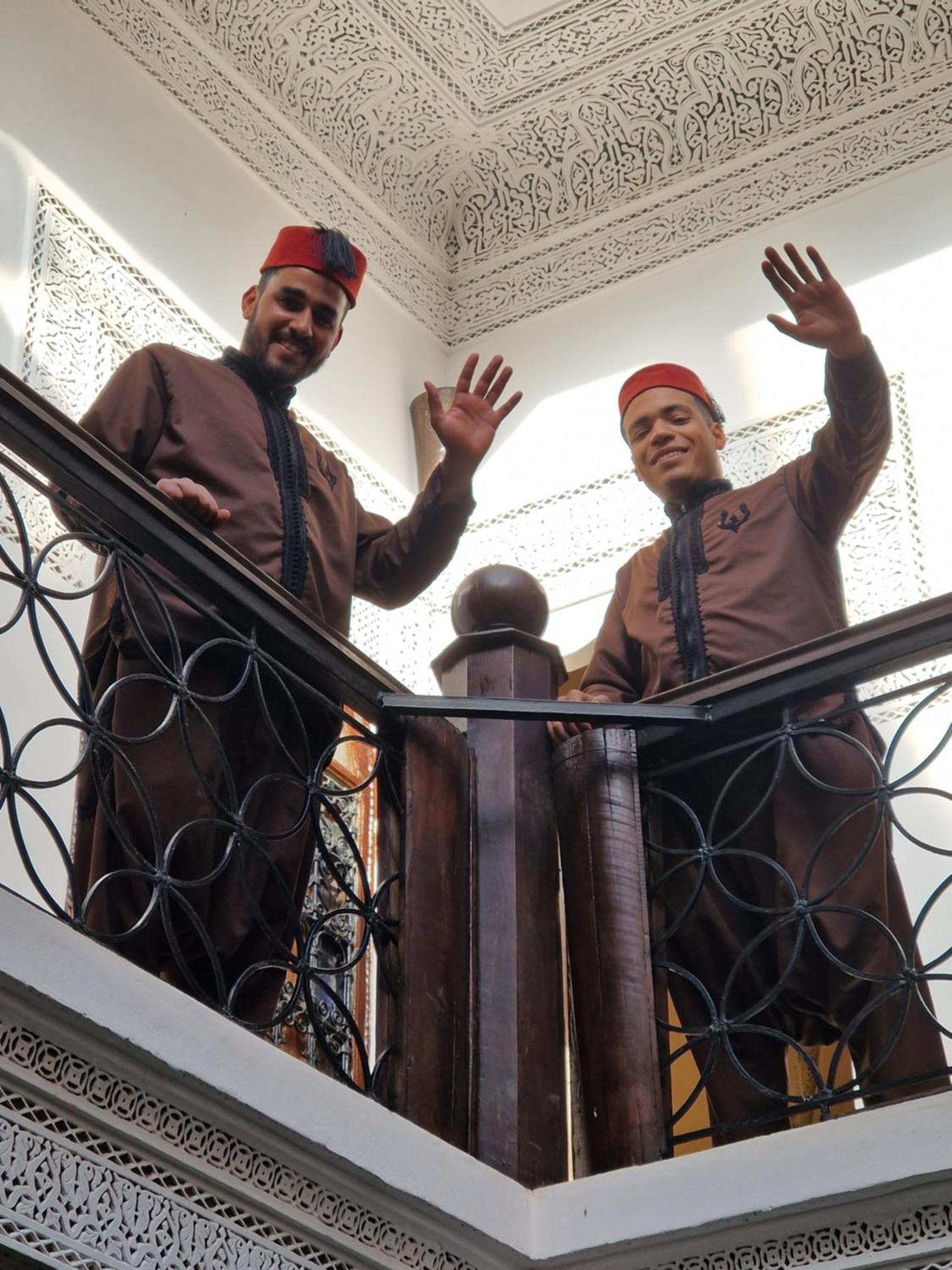 Riad Les Nuits De Marrakech Marrakesh Exterior photo Two Moroccan men wearing the Jebba